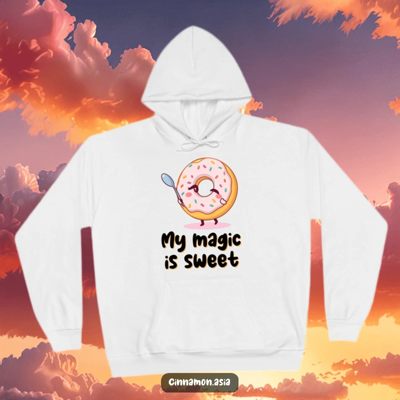 Funny hoodie featuring a winking donut with sprinkles, magically levitating a tiny spoon, perfect for cozy spells.